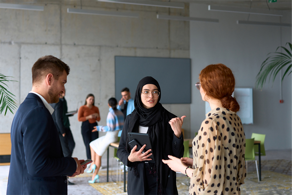 Researchers discussing paper presentations